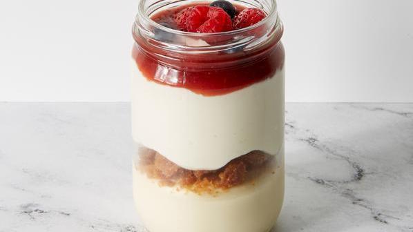 Mixed Berry Cheesecake Jar · New York style cheesecake, almond crumble, strawberry compote, fresh strawberries, blueberry and raspberry.