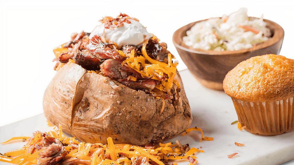 Bbq Stuffed Baked Potato · Choose from: Georgia Chopped Pork, BBQ Pulled Chicken or Texas Beef Brisket with cheddar cheese bacon, sour cream and whipped butter.