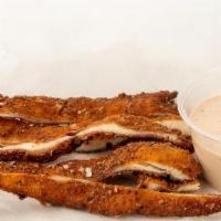 Cutlets Strips · One Cutlet sliced into strips and served with your choice of sauce