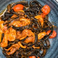 Black Squid Ink Frutta Di Mare · Calamari, shrimp, heirloom cherry tomatoes,
spicy bread crumbs.