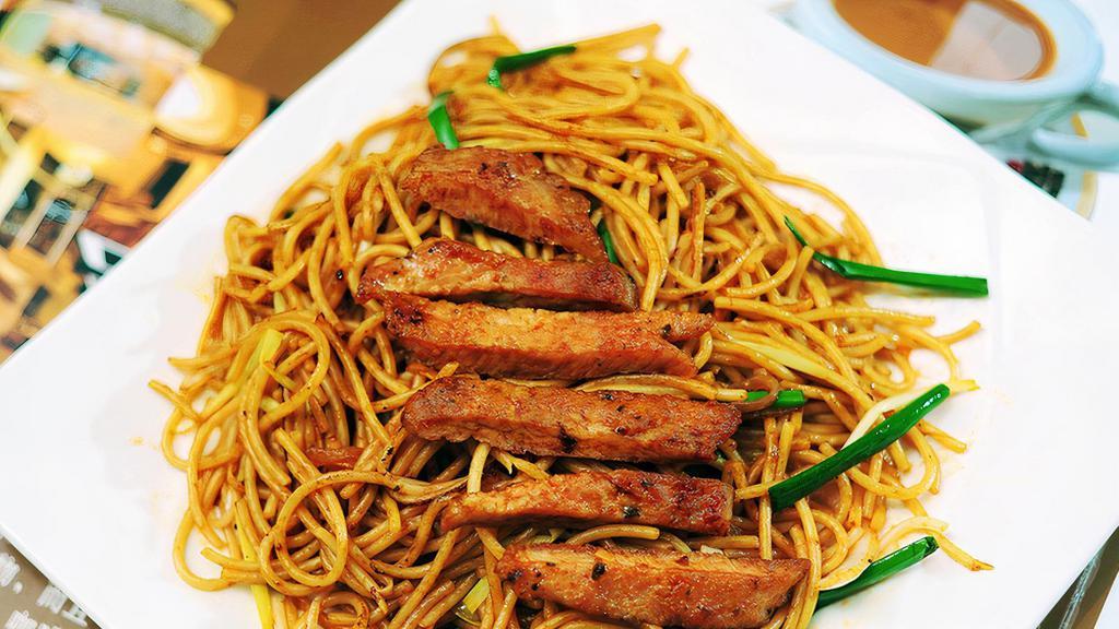 Stir-Fried Spaghetti With Pork Chop 干炒猪扒意粉 · 