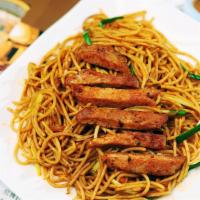 Stir-Fried Spaghetti With Pork Chop乾炒豬扒意粉 · 