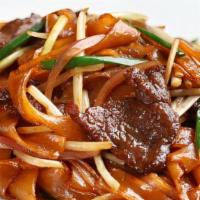 Stir-Fried Rice Noodles With Sliced Beef乾炒牛河 · Choice with sliced beef or chicken.