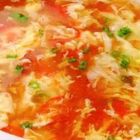 Tomato And Sliced Pork Soup With Egg 鮮茄蛋花肉片湯 · 