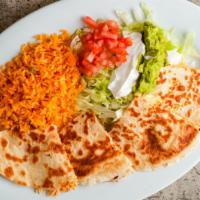 Rellena #223 · Choice of shredded chicken, beef tips or ground beef. Cheese and beans layered between two g...