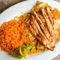 Chicken A La Fiesta #32 · Homemade corn tortilla chips cooked with green tomatillo sauce, cheese and grilled chicken. ...