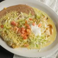 Chimichangas · Two flour tortillas (soft or fried) filled with your choice of beef tips or shredded chicken...