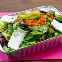 Agora Salad · Mixed greens, tomatoes, cucumbers, red onions, shredded carrots, sliced feta cheese, mild pi...