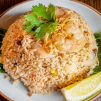 Thai Fried Rice · Fried rice with onions, tomatoes, Asian broccoli and eggs. Can be made gluten-free.