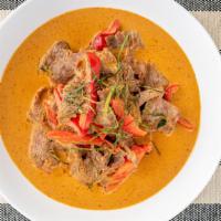 Panang Curry · Gluten free, spicy. Coconut milk, red bell peppers, panang curry paste with kaffir leaves. G...