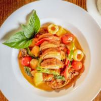Lovely Duckling · Gluten free, spicy. Boneless duck in red curry paste, coconut milk, tomatoes, pineapples, be...