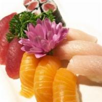 Matsu Sushi · Three pieces tuna, three pieces of salmon, three pieces yellowtail and one tuna roll. Served...
