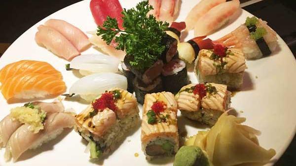 Sushi For 2 · One chef's special roll, one tuna roll and 20 pieces of sushi. Served with miso soup or green salad.