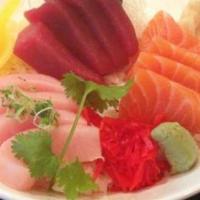Tri-Color Sashimi · Four pieces tuna, four pieces salmon and four pieces yellowtail. Served with miso soup or gr...