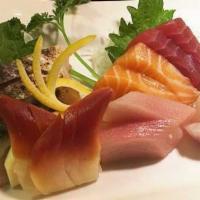 18 Pieces Sashimi Deluxe · Served with miso soup or green salad.