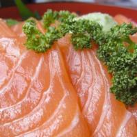 Salmon Don · Sliced salmon over seasoned rice. Served with miso soup or green salad.