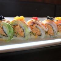 Spicy Rainbow Roll · Spicy. Spicy tuna inside, topped with assorted fish and avocado.
