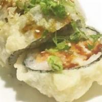 Fantastic Roll · Smoked salmon, eel, avocado, asparagus and cream cheese, topped with light tempura and jalap...