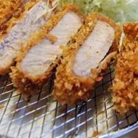 Tonkatsu · Deep-fried breaded pork cutlet. Served with miso soup or green salad and rice.