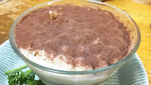 Tiramisu · Sponge espresso cake with mascarpone cream and cocoa powder.