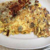 Red Flame Omelette · Ham, bacon, sausage & cheese.