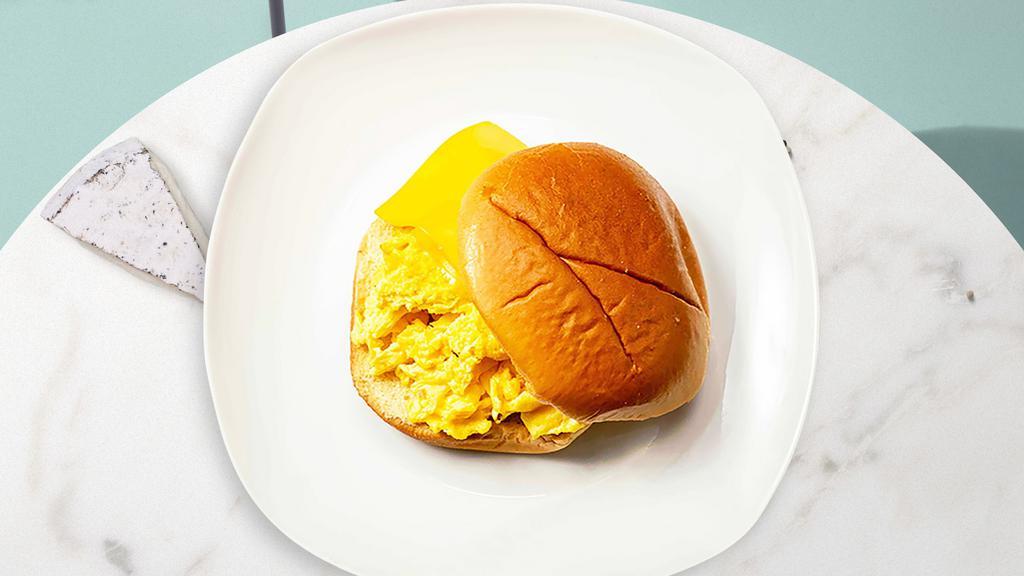 Cheesy Eggs Sandwich · Two scrambled eggs and cheese served on your choice of bread.