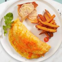 Cheesy Triad Omelette · Eggs cooked with Boar's Head® Mild Swiss, American and Wisconsin Cheddar Cheese as an omelet...
