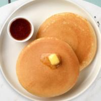 Buttermilk Pancakes · Three pieces of fluffy buttermilk pancakes cooked with care and love and served with butter ...