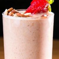 Joyful Almond Buttercup · almond milk, almond butter, cacao powder, dates, strawberries and banana