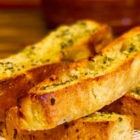 Hot Focaccia Garlic Bread · Lemon + Herbs (v)