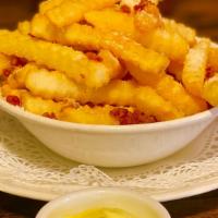 Crinkle-Cut Fries  · Parmigiana + Garlic Aioli (v)