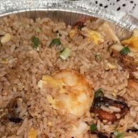 Arroz Chaufa Con Pollo · Fried rice mixed with chicken