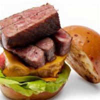 Miyazaki A5 Steak Burger · Signature wagyu patty, A5 steak (2 oz), and sansho-pepper sauce.