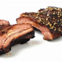 Spare Ribs · Served with tofu slaw. Pork baby ribs slow-cooked, tender, and flavorful.