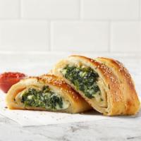Spinach Stromboli · Spinach, Ricotta, Mozzarella and Romano cheese rolled in-hand-stretched dough and baked to p...