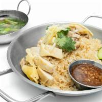 Khao Man Kai · Recommends. Steamed chicken Hanoi style. Served with cucumber, ginger rice and ginger sauce....