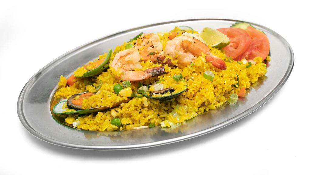 Deluxe Paella Seafood · Recommends. Spain and Thai's style rice cooking with mixed seafood (Shrimp 5, Squid 5, Mussel 5) corn, snow pea and carrot, crab paste and Cajun seasoning.