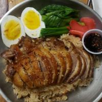 Thai Maple Duck Over Rice  · Sliced Roasted Duck, Yu- choy, ginger pickle, boiled egg with Garlic Rice and sweet soy sauc...