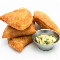 Empanadas (4)  · Recommends. Popular. 4 pcs. Thai Curry Puff Traditional puff pastry stuffed with curry chick...