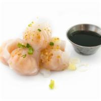 Shrimp Dumpling (5) · Steamed Shrimp dumpling, fried garlic with soy vinaigrette sauce.