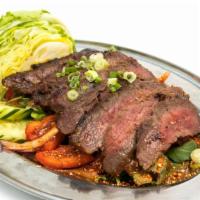Steak Salad · Must try. Mild. Recommends. Grilled steak, green leaf, mint, tomato, cucumber, bell pepper a...