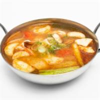 Tom Yum Soup · Spicy lemongrass broth (16 oz.) with cilantro, mushroom, onion, tomato, scallion and Choice ...