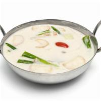 Tom Kha Soup  · Coconut milk soup (16 oz.) with galangal, mushroom, lime leaf, lemongrass, onion and scallio...