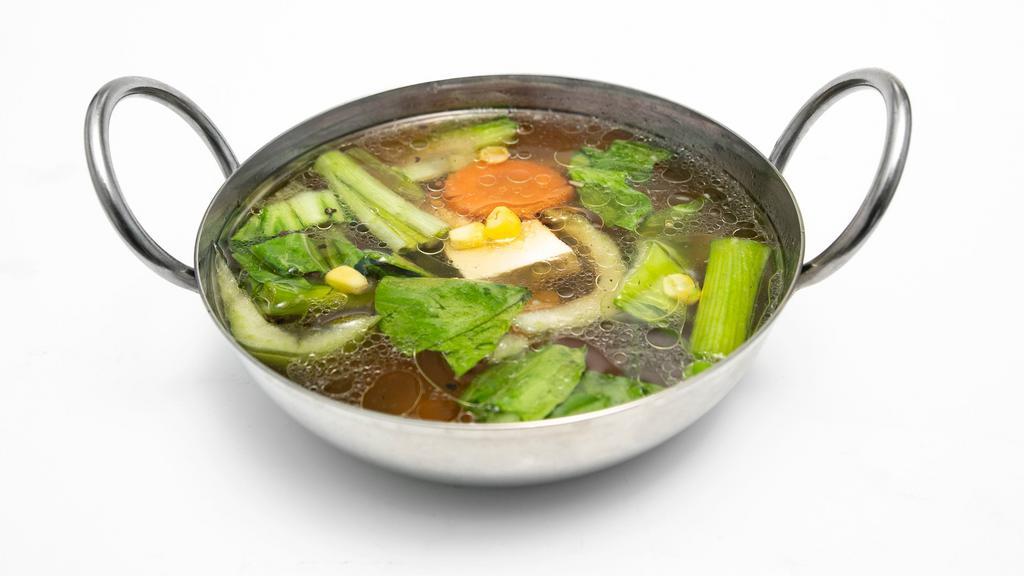 Tom Jead Soup · Clear broth (16 oz.) with mixed vegetable, onion, scallion, garlic and Choice of Protein. Vegan.
