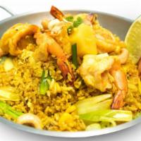 Pineapple Fried Rice · Stir fried rice with Pineapple, egg, onion, cashew nut, corn, snow pea and carrot and curry ...
