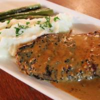 Ny Strip Steak  · Herb-Roasted Potato Wedges, Green Salad and Chimichurri Sauce