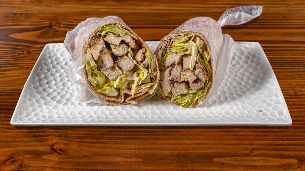 Chicken Caesar Wrap · Grilled chicken, romaine, parmesan and caesar dressing.