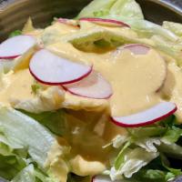 House Salad · Garden greens with house ginger dressing.
