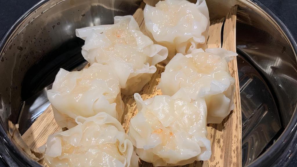 Shrimp Shumai · Steamed shrimp dumpling.
