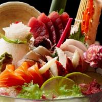 Tricolor Sashimi · Raw. Six pieces of tuna, six pieces salmon, six pieces of yellowtail sashimi with exotic pre...